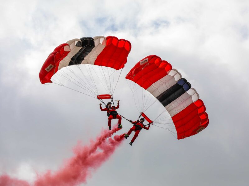 Two of the Red Devil Parachute Regiment performing in the sky above